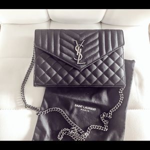 SAINT LAURENT tri-quilted chain wallet or clutch